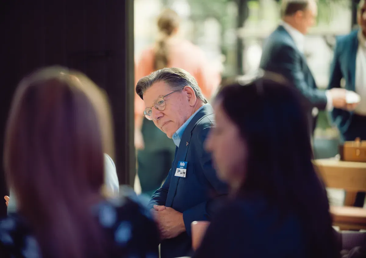John Franklin Wiley listening intently in a group