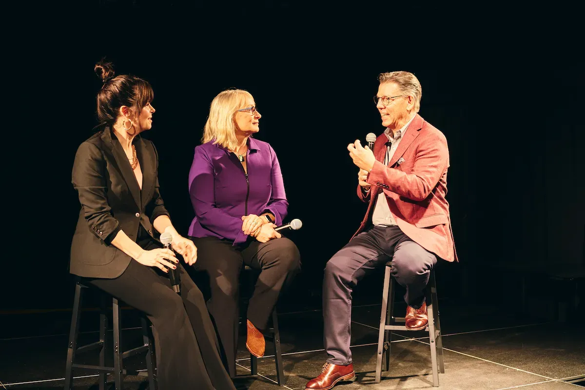 John Franklin Wiley on stage during a panel discussion